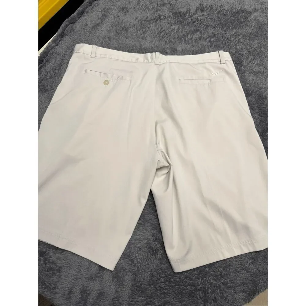Nike Golf Tour Performance Khaki Shorts, Size Men’s 38. Color is beige.
